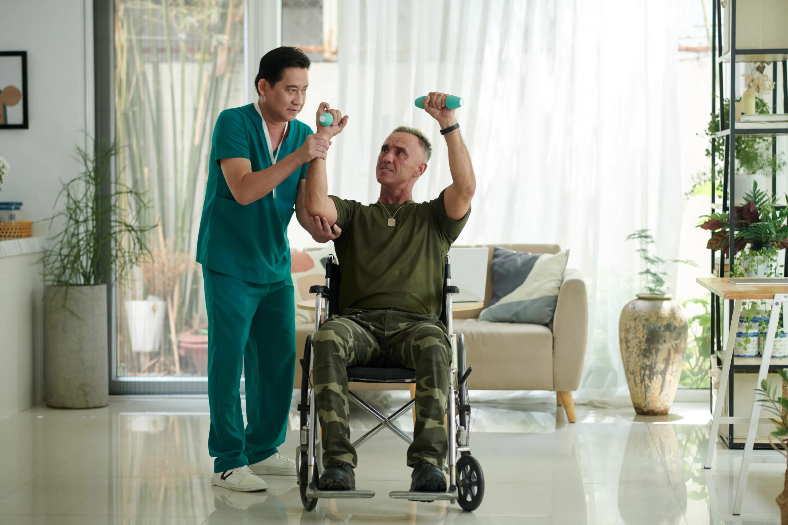 Compassionate caregiver providing personalized VA home care in Little Elm, TX to a senior Veteran client in a cozy home setting.